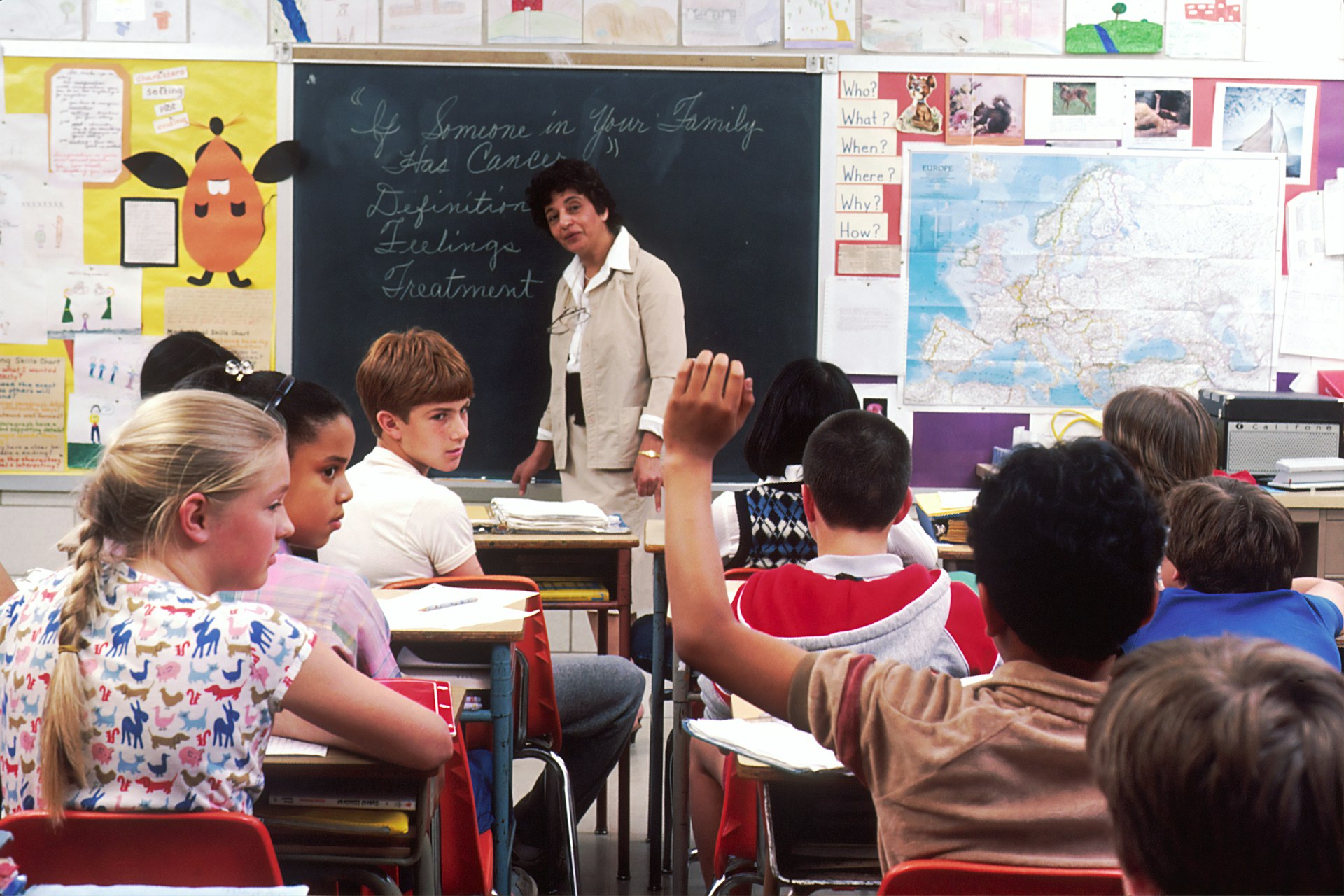 A teacher leading a classroom discussion